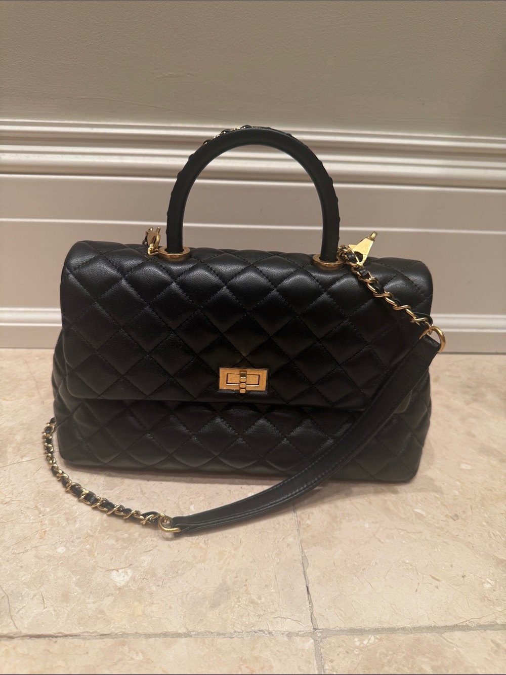 Black Quilted Top-Handle Shoulder Bag with Gold Hardware